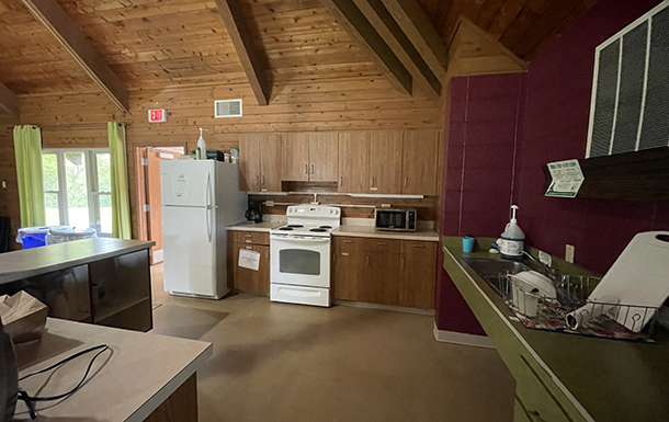 the kitchen of the gemini building at camp