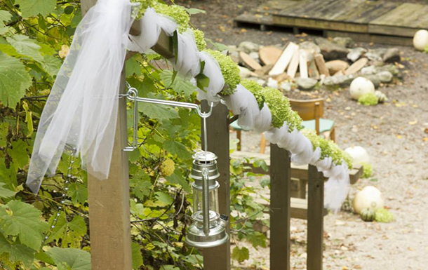 close up of aisle decor in the firebowl area at camp for a wedding