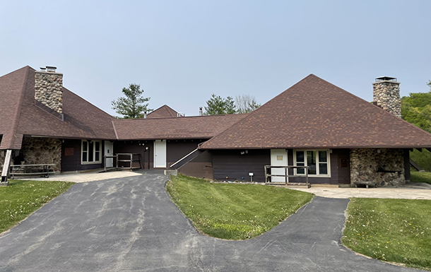 exterior of a brown building at camp