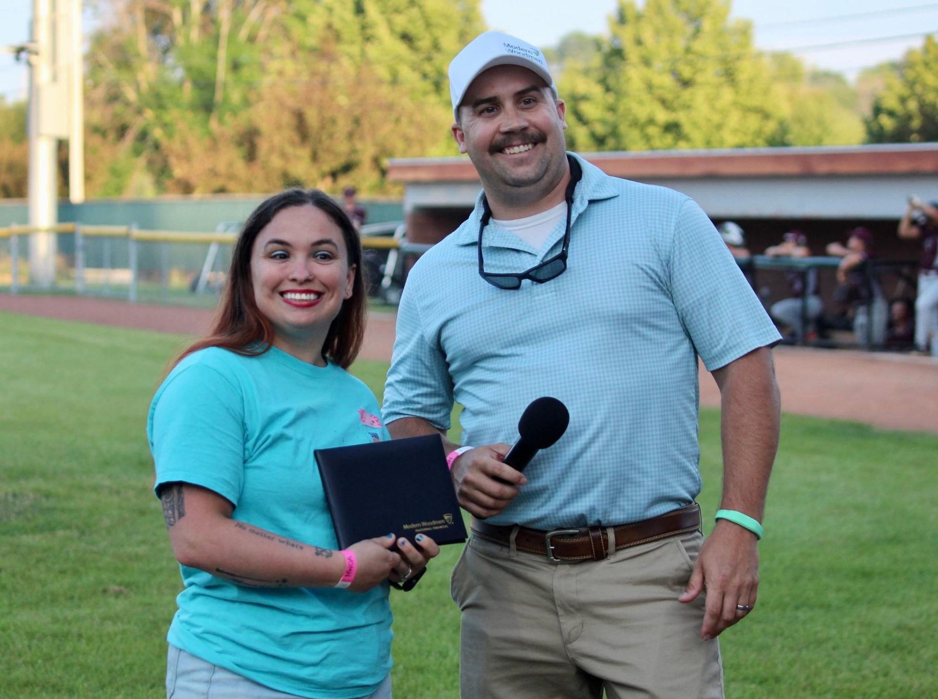 Angella receiving her award on the field