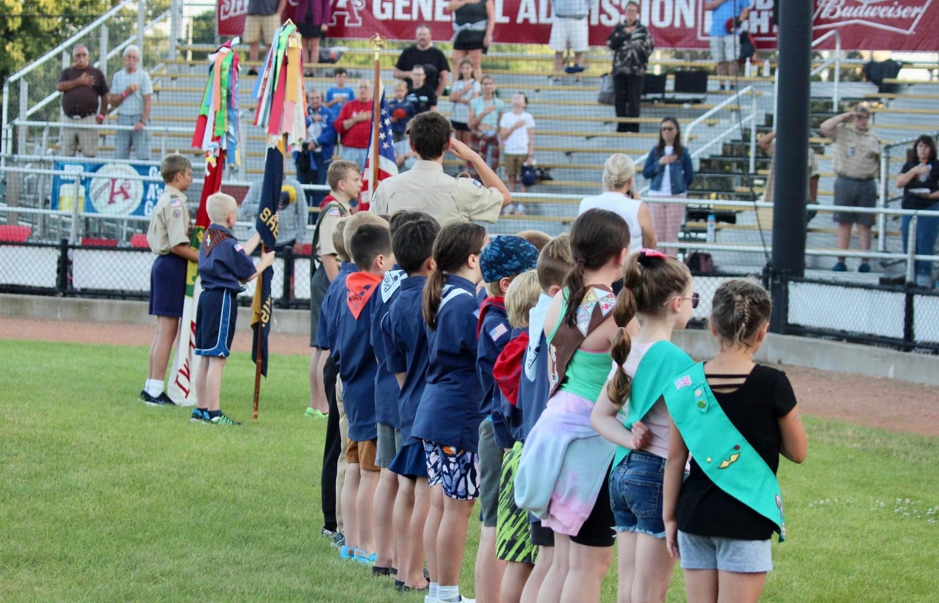 Girl Scouts putting their hand on their heart